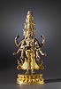 A Tibetian 17/18th Century figure of Avalokiteshvara, patinated bronze, partly fire gilded